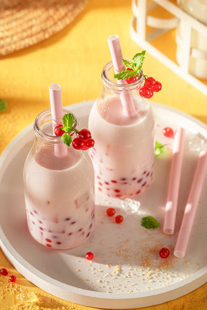 Delicious and homemade red currant bubble tea made of forest. Chilled drink for hot days.の写真素材