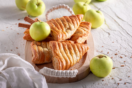 Delicious apple triangle cake made of cinnamon, fruits and milk. Yeast cake with cinnamon and crumble.の写真素材