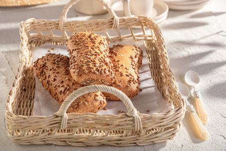Tasty sunflower seed ciabattas made of wheat flour. sunflower seed rolls and ingredients in the...