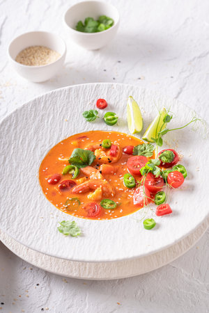 Elegant Thai soup in exclusive restaurant made by the chef. Thai soup with an exquisite decoration.の写真素材