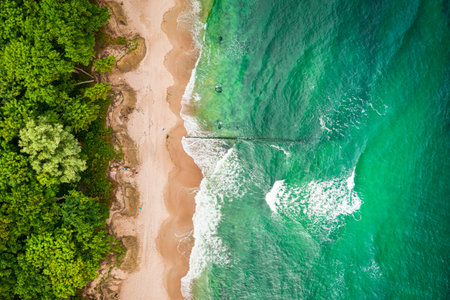 Breathtaking blue waves on Batlic sea. Vacation at the seaside. Aerial view of sea in Poland, Europeの写真素材
