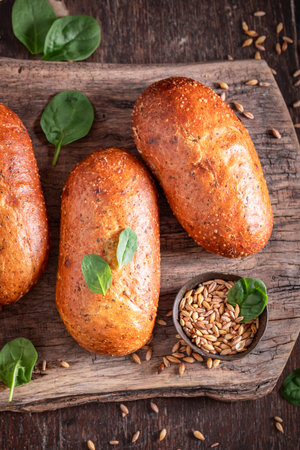 Delicious and healthy spinach buns made with green leaves. Spinach flavored wheat buns.の写真素材