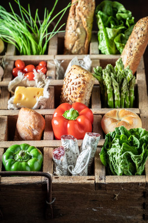 Tasty and healthy sandwich with vegetables, cheese and herbs Fresh ingredients for a healthy meal.の写真素材