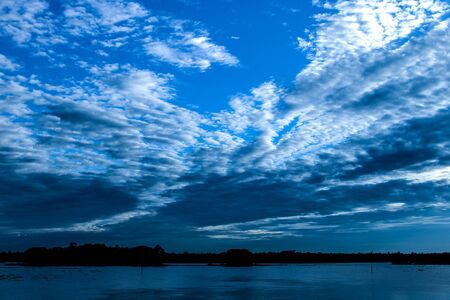 The Beautiful Sky On a Riverの写真素材