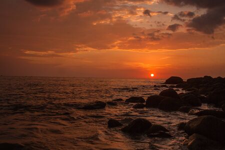 Beautiful sunset over the Phuket Beach, Thailandの写真素材