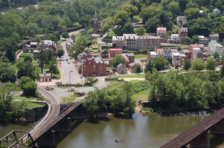 Aerial view of small town at river bankの写真素材