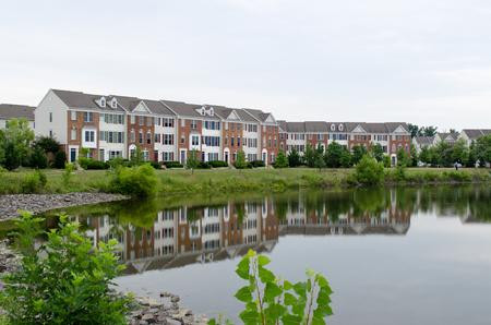 Houses at water pondの写真素材