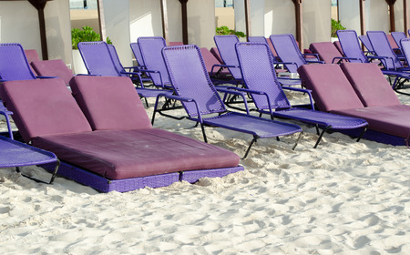 Relaxing chairs at beach for sun bath. Summer, mexico