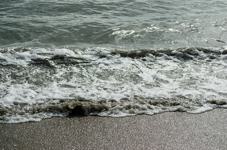 Water waves at beach. Travel, coast