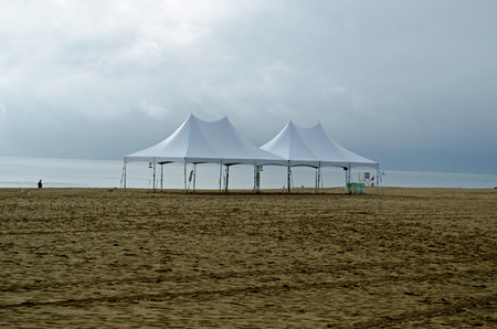 White tent at beachの写真素材