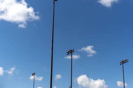 Stadium Lights with blue sky background