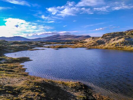 Scenic view on Ponds and Dunes with hills far behindの写真素材