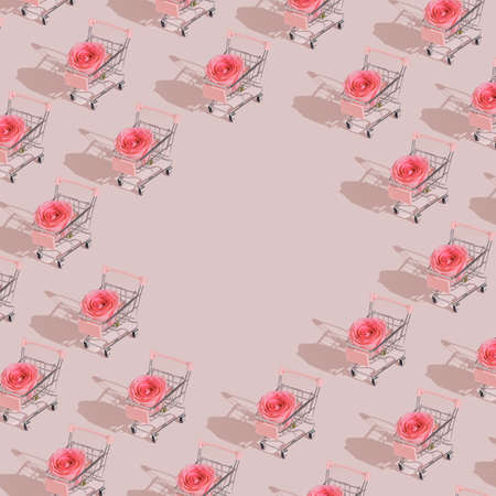 Pastel pink Valentine shopping pattern made with cart and rose. Minimal modern concept with copy space.の写真素材