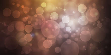brown glitter bokeh lights defocused abstract background wallpaperの写真素材