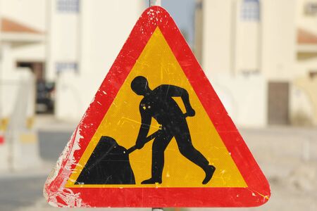 Men at work sign board