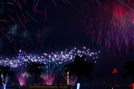 Background image with beautiful colorful firework texture background with different color of fireworks.の写真素材