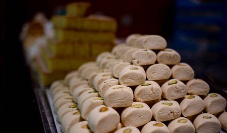 Background image with multiple lebanese traditional sweets.