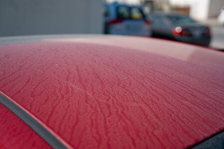 Background image of a car with dust on the hoodの写真素材