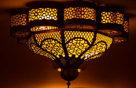 Morocco Ornate metal lamp in the wall of a mosque, Qatar.Morocco style lamp or lantern.の写真素材