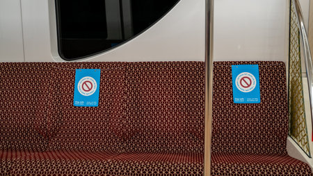 Doha, Qatar- October 29 2020 - Qatar metro compartment interior. seats with social distancing sign due to Covid 19. social distancingのeditorial素材
