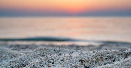 Colorful vibrant ocean beach sunrise during a summer day.の写真素材