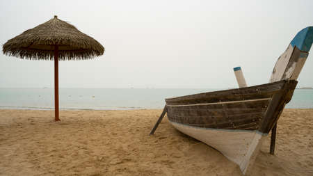 Wakrah, Qatar- January 21,2022 : Family beach in the Wakrah souq (Traditional Market) along with...