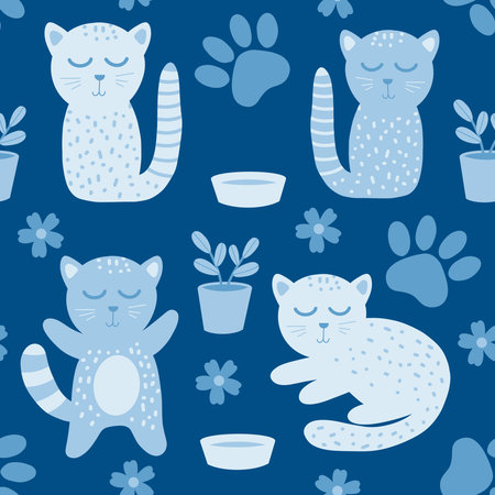 Cats and paw prints seamless pattern. Cute hand drawn cats and flowers on blue background. Children's animal allover printの写真素材