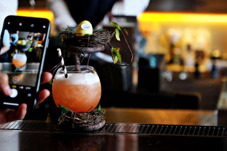 Take a photo of a beautiful cocktailの写真素材