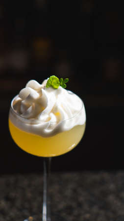 A glass of ice cream cocktail on the marble barの写真素材