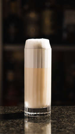 A Ramos gin fizz cocktail on the marble barの写真素材