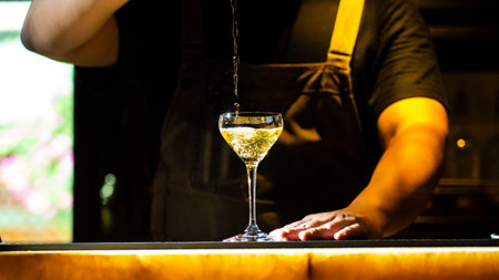 The moment the bartender prepares a cocktailの写真素材