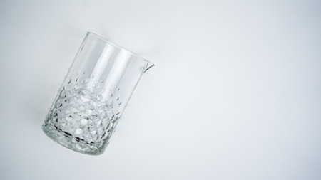 A mixing glass on a white backgroundの写真素材