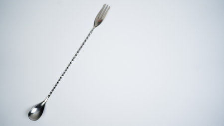 A bar spoon on a white backgroundの写真素材