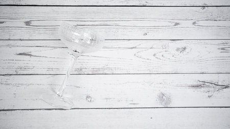 Coupe glass on white wooden backgroundの写真素材