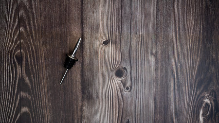 A pourer on wooden backgroundの写真素材