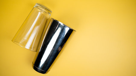 A boston shaker on a bright yellow backgroundの写真素材