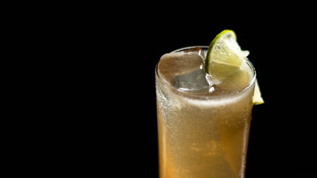 A long island iced tea cocktail on a black backgroundの写真素材