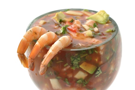 Closeup of three shrimp on edge of cocktail glass on white backgroundの写真素材