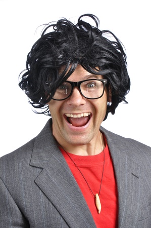 Closeup of crazy happy nerd with wild wig on white backgroundの写真素材