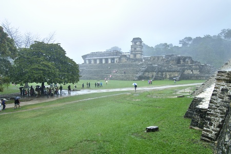 Palenque, Chiapas, Mexico - December 21, 2012: Heavy rains fail to dampen the spirits of travelers visiting the ancient Maya ruins on the final day of the Maya calendar on December 21, 2012のeditorial素材