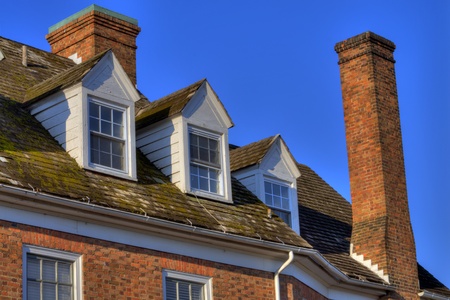 Detail of colonial style architecture of upper level of home in Williamsburg, Virginiaの写真素材