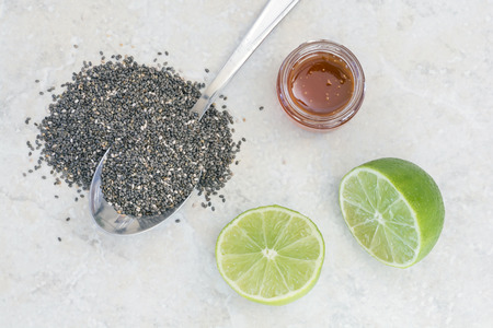 Chia seed, honey, limes, ingredients used to make chia beverage called iskiate or chia frescaの写真素材