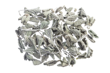 Closeup of dried Marrubium vulgare horehound medicinal herb leaves isolated on white backgroundの写真素材