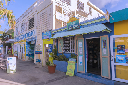 ISLA CULEBRA, PUERTO RICO - JANUARY 23, 2014: Shops offering souvenirs, clothing accessories, kayaks, bikes, and snorkels open their doors in wait for more tourists to arrive by ferry boat on Isla Culebra.のeditorial素材