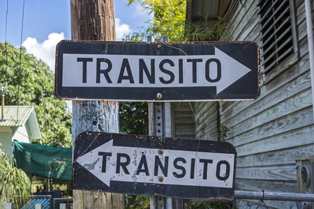 Contradicting opposing one way traffic signs in small Puerto Rico communityの写真素材