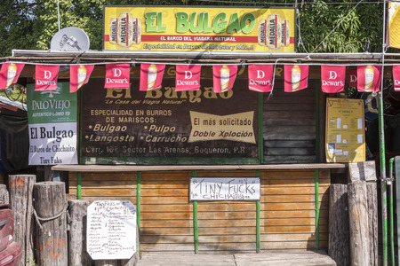 BOQUERON, PUERTO RICO, USA - JANUARY 17, 2014: \"El Bulgao\" food kiosk specializes in unique seafood meals in the beach town of Boqueron on Puerto Ricoのeditorial素材
