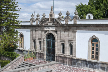 Exterior and entrance to the ancient Tepeyac cemetery located on top of Tepeyac Hill near the Basilica of Guadalupe in Mexico Cityのeditorial素材