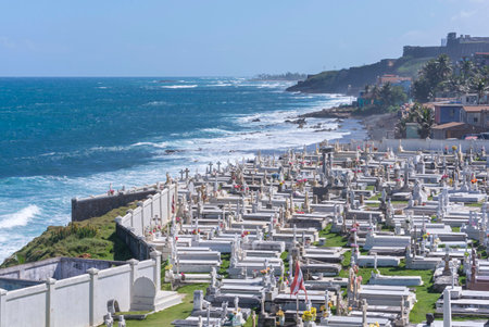 Beautiful wide angle view of Santa Maria Magdalena de Pazzis Cemetery above the sea cliff overlooking the Atlantic coast in Old San Juan, Puerto Ricoの写真素材