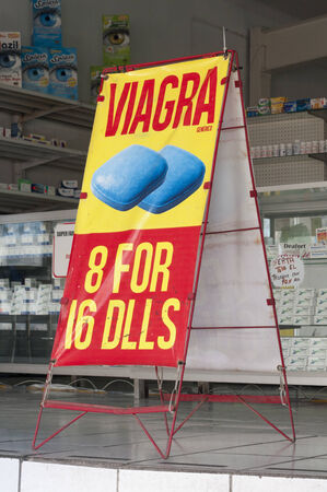 TIJUANA, MEXICO - NOVEMBER 13, 2014: Cheap generic Viagra pills are advertised and sold in many pharmacies in Tijuana, Mexicoのeditorial素材