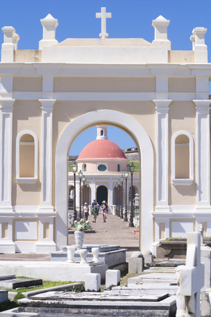 SAN JUAN, PUERTO RICO - JANUARY 29, 2014: Historical graves and beautiful architecture attact tourists to visit Santa Maria Magdalena de Pazzis cemetery in Old San Juan.のeditorial素材